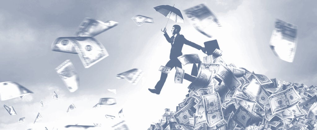 a man with an umbrellas running through money